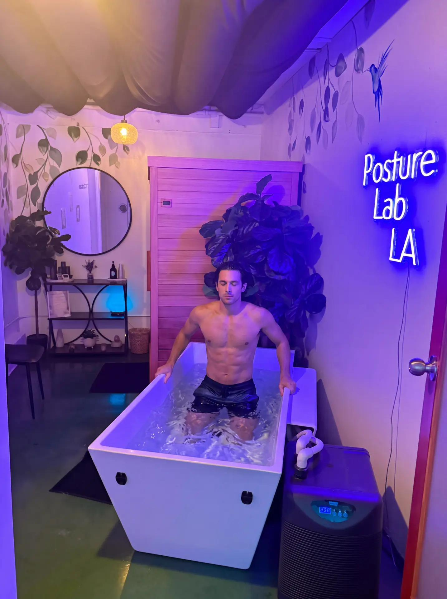 A guest using the private cold plunge
